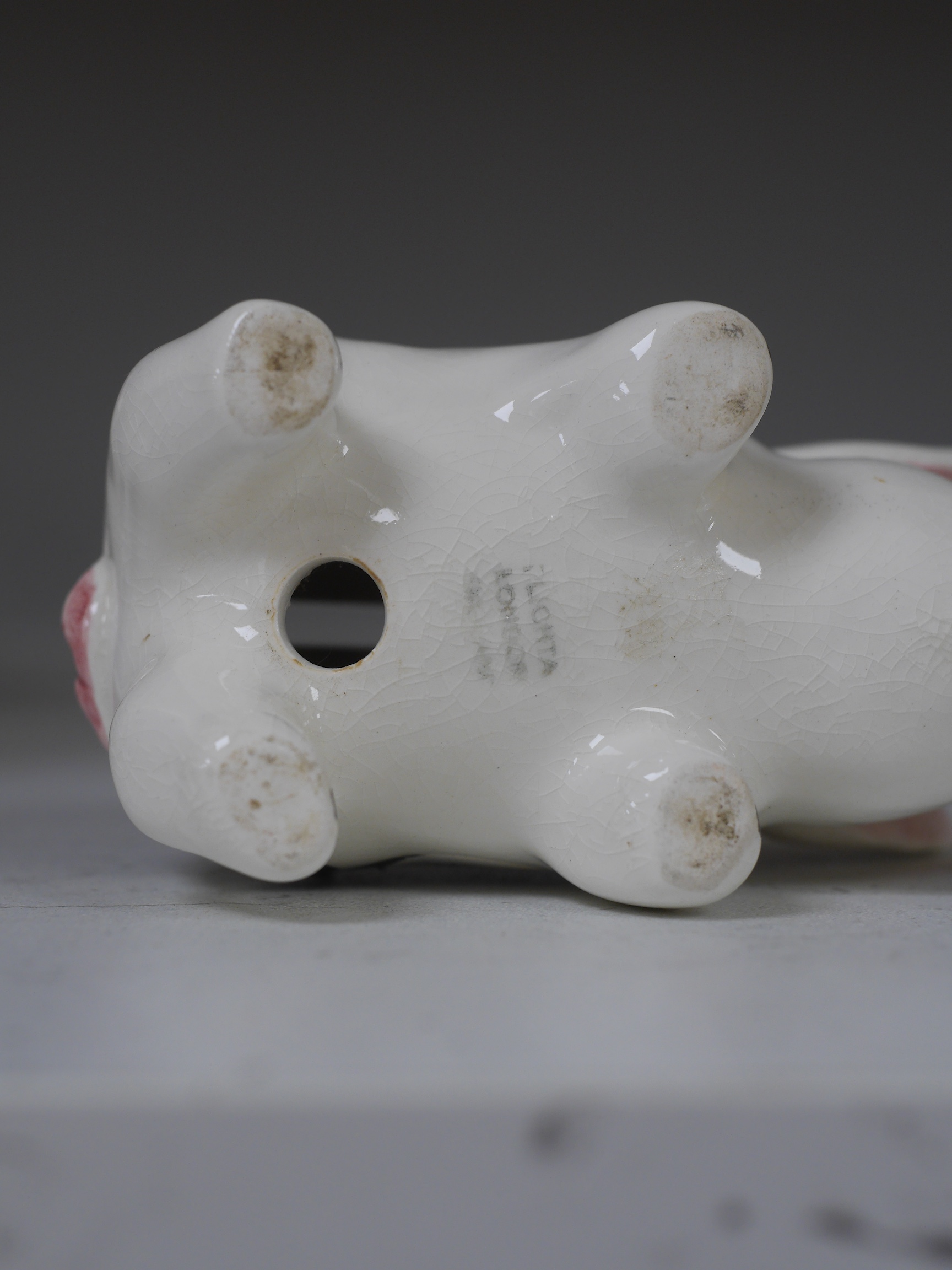 Three Plichta ‘pig’ ceramic money banks, each stamped to the bases, largest 16cm wide. Condition - fair